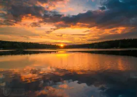 Der Geyersche Teich. Sonnenuntergang mit Spiegelung im Wasser